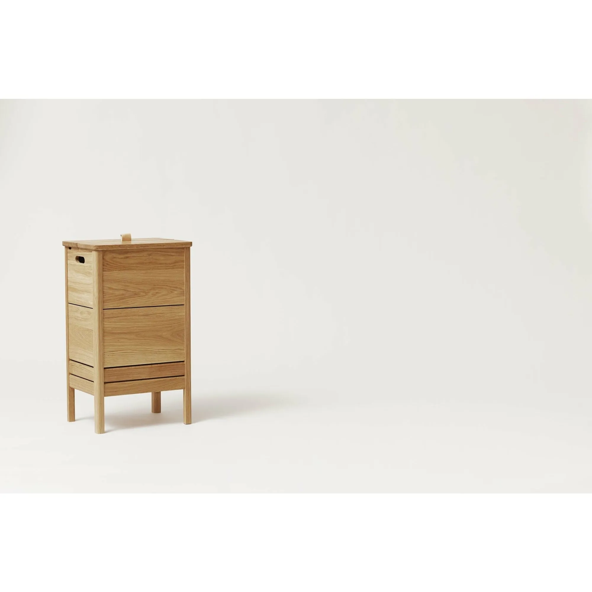 Form & Refine A Line Laundry Box. Oak