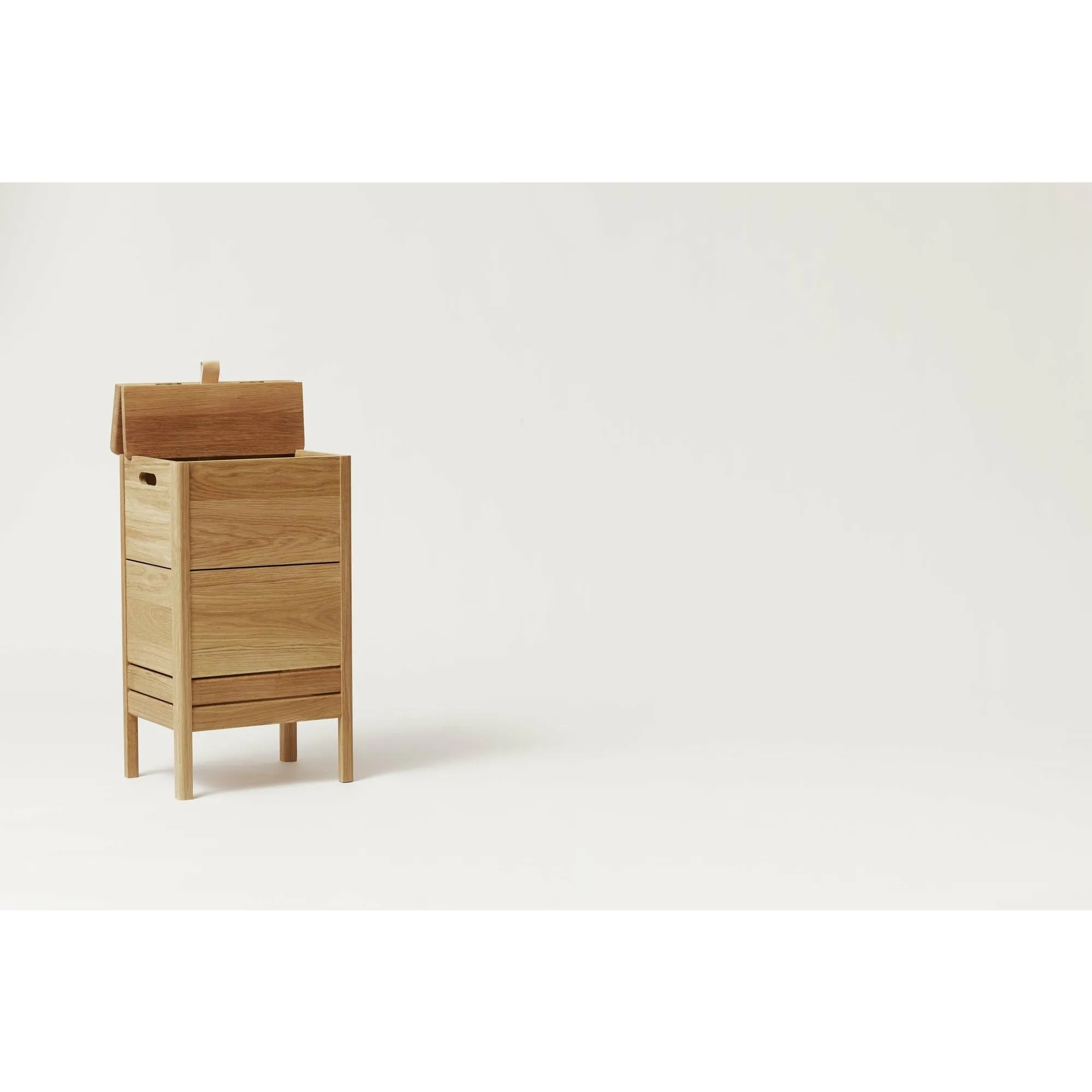 Form & Refine A Line Laundry Box. Oak