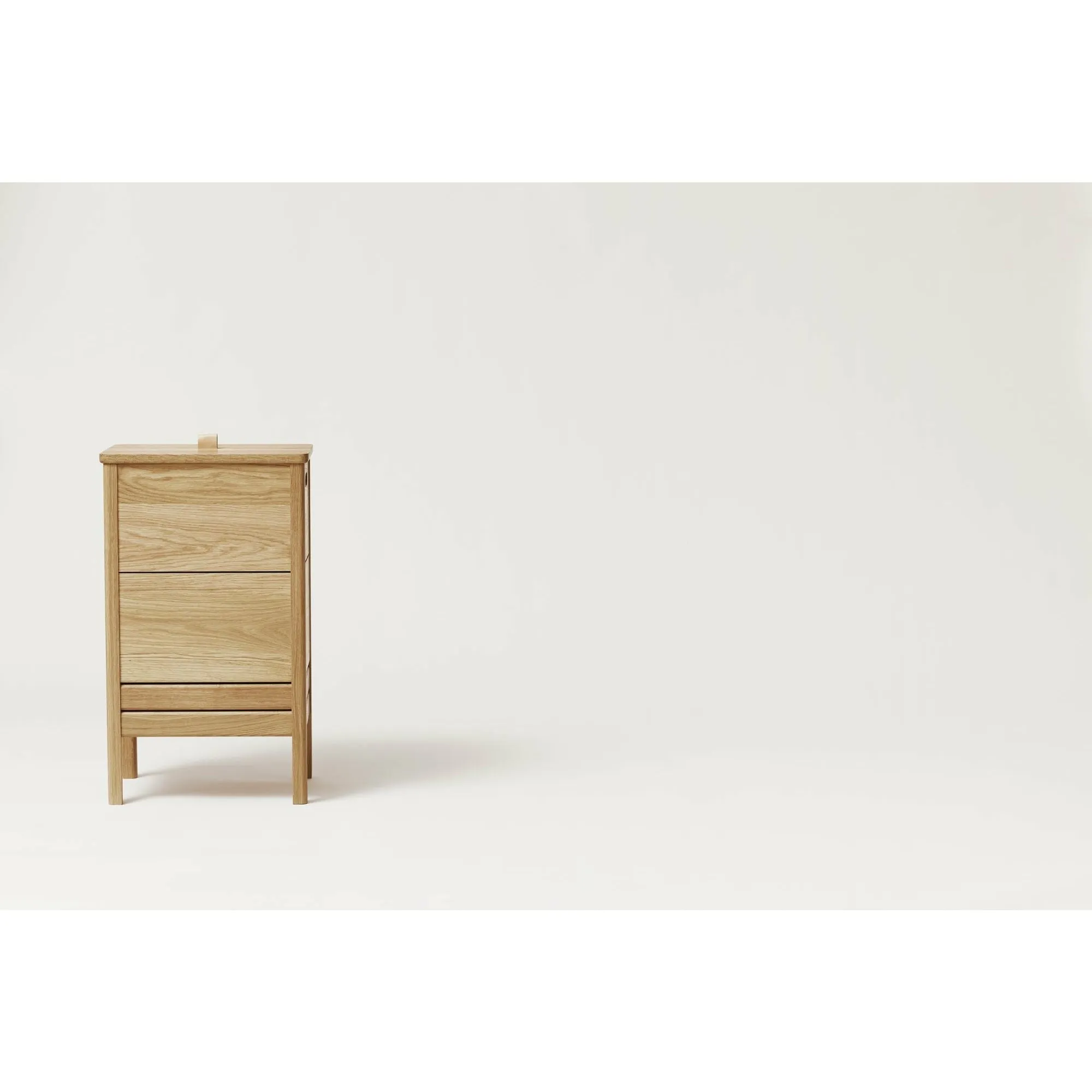 Form & Refine A Line Laundry Box. Oak