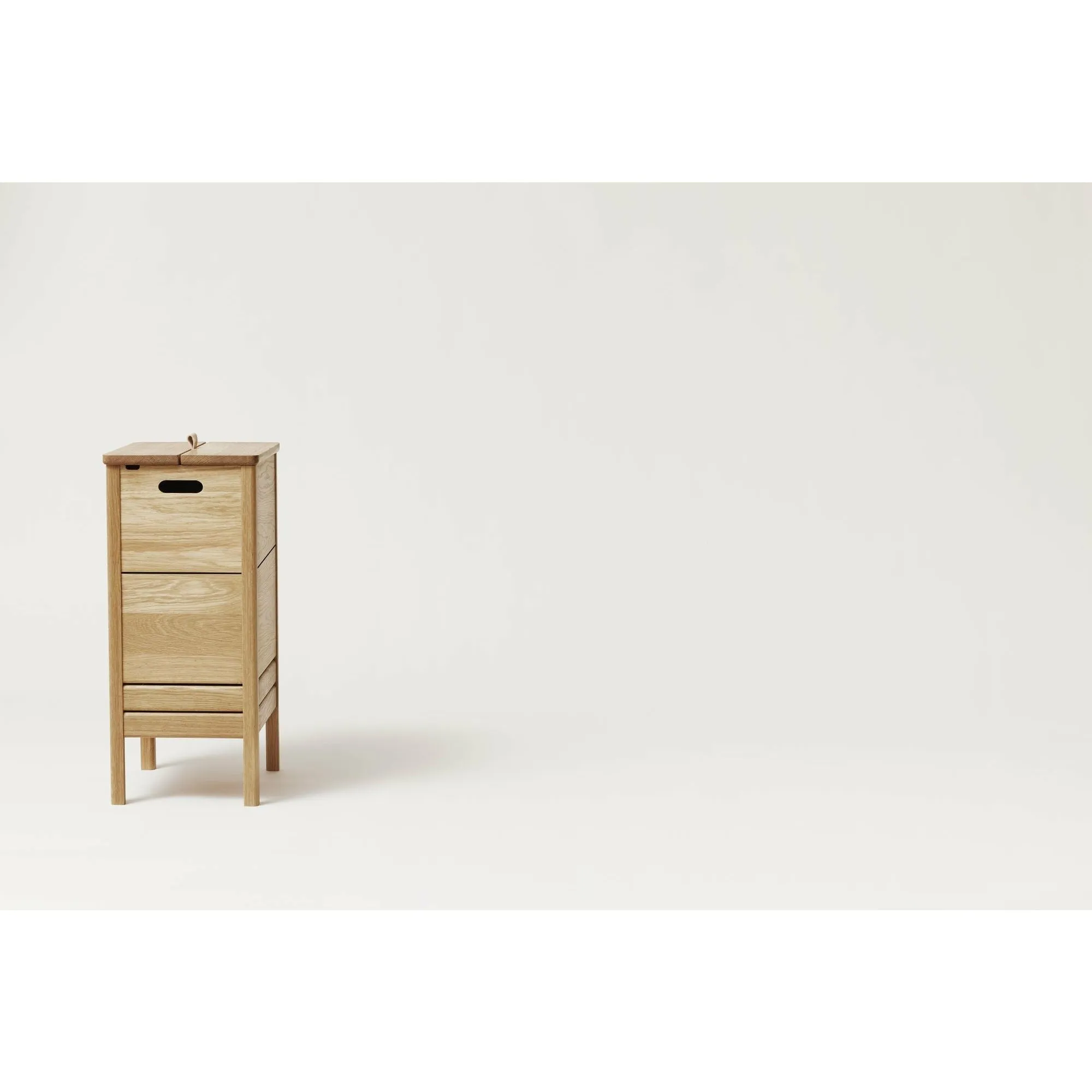 Form & Refine A Line Laundry Box. Oak