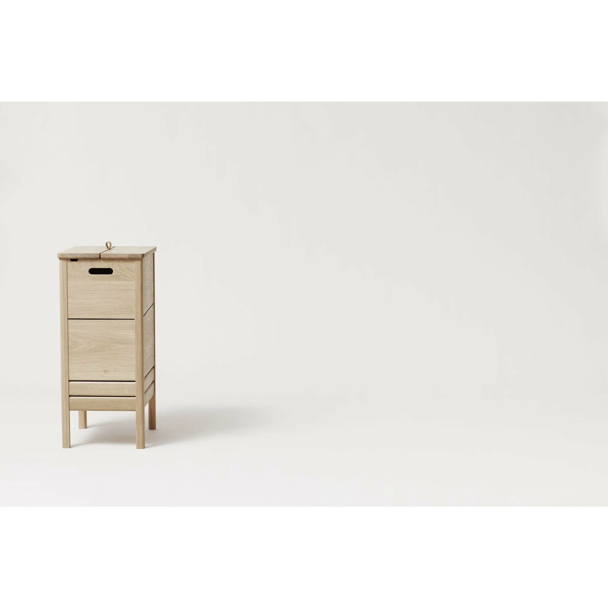 Form & Refine A Line Laundry Box. White Oak